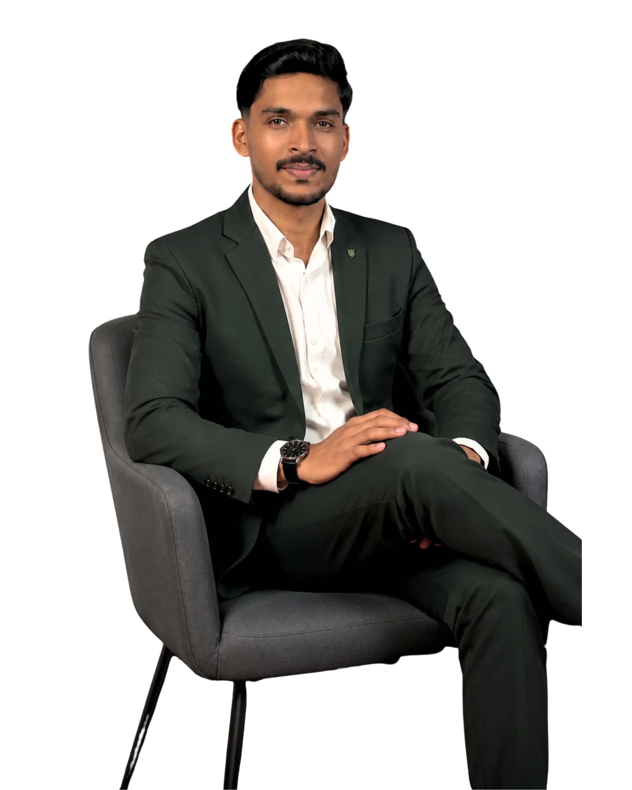 Mohammed Hafiz seated in a dark suit